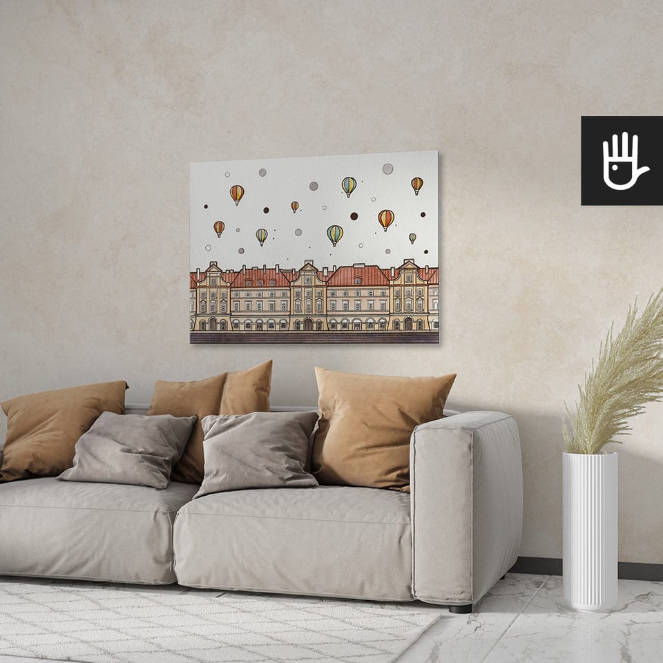 Jasny przytulny salon z dużą beżową kanapą na tle obrazu z architekturą placu zamkowego w lublinie