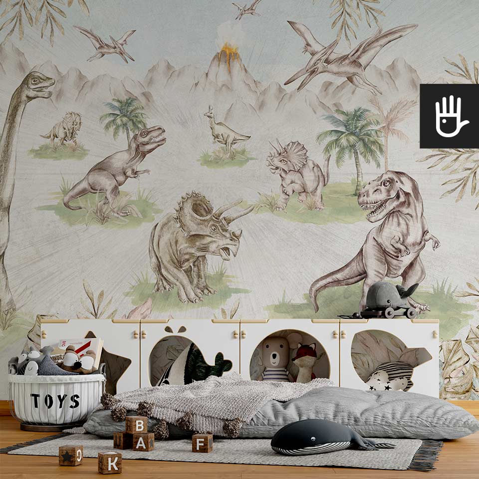 Przytulny pokój dziecięcy z pojemnikami na zabawki w ciekawych kształtach i wieloma pluszakami na tle fototapety w tropikalny wzór z dinozaurami